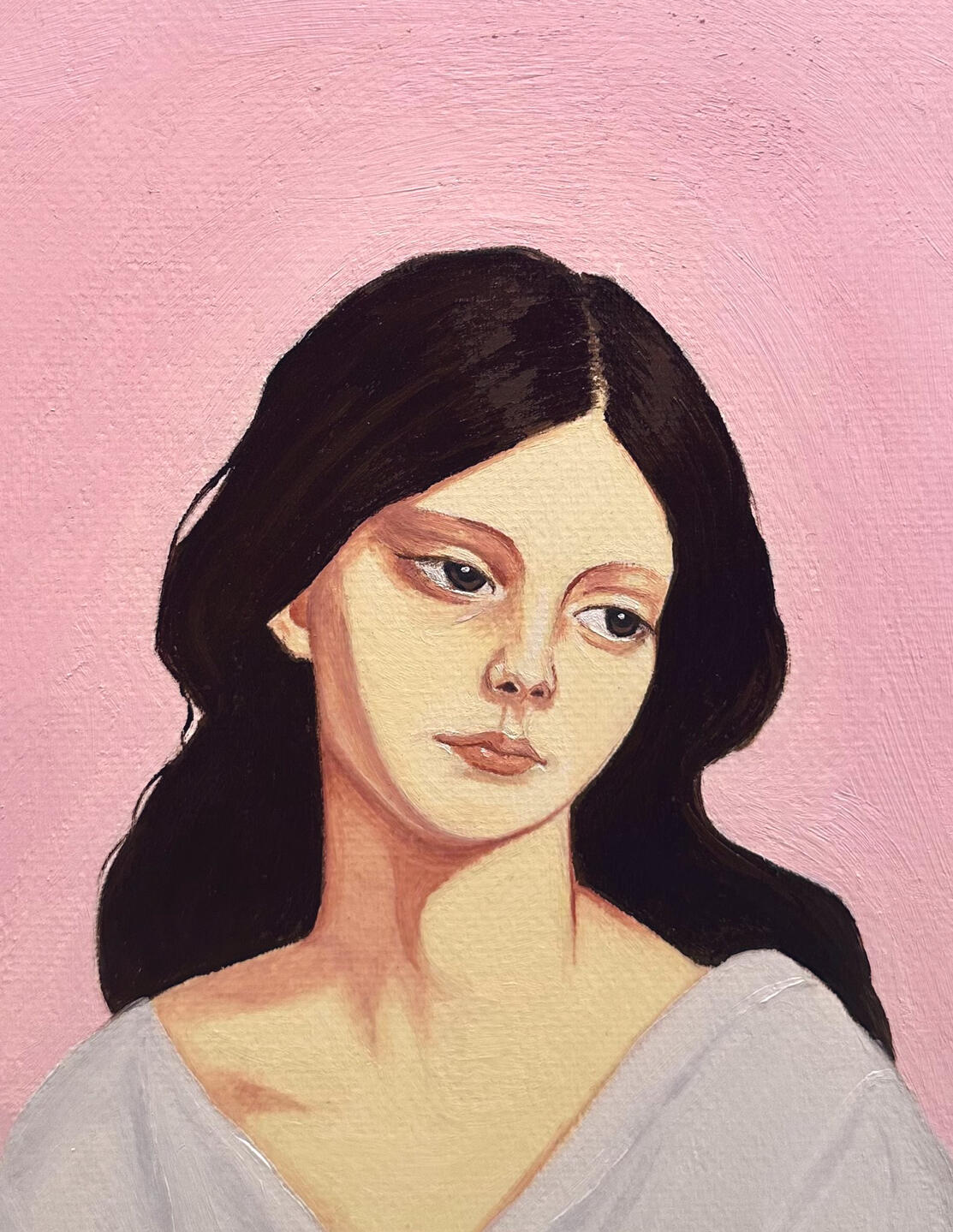 Portrait of a woman An oil painting of a young woman with pale skin and dark hair.